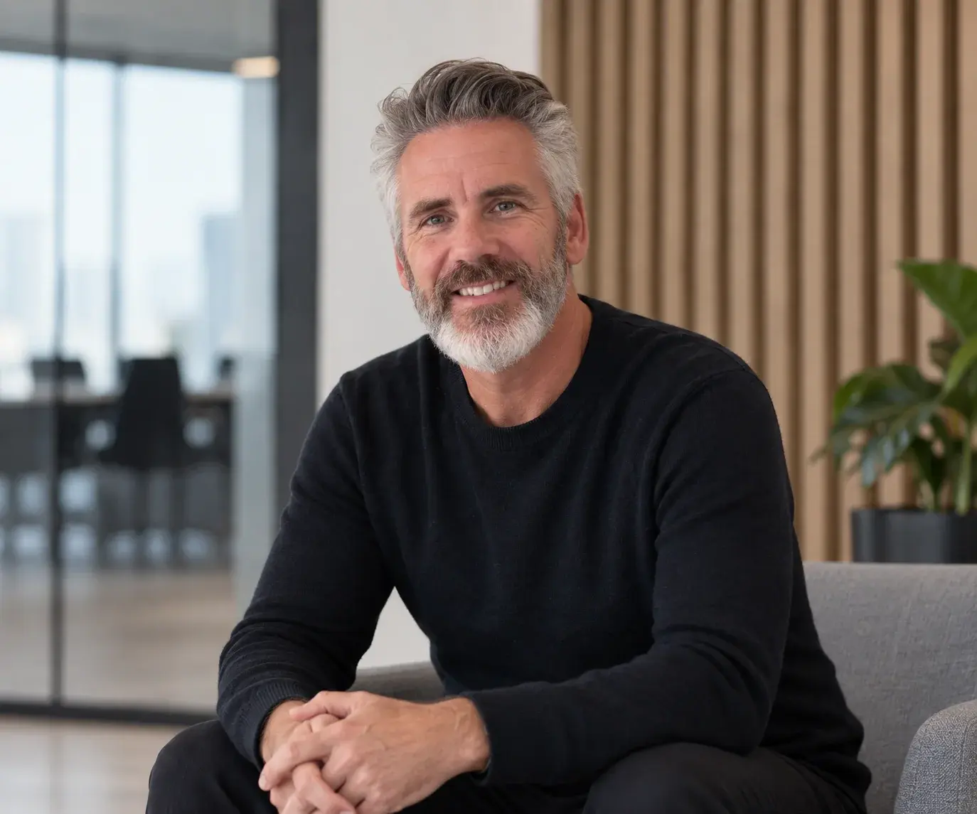 Portrait of Derek Young in a contemporary workplace